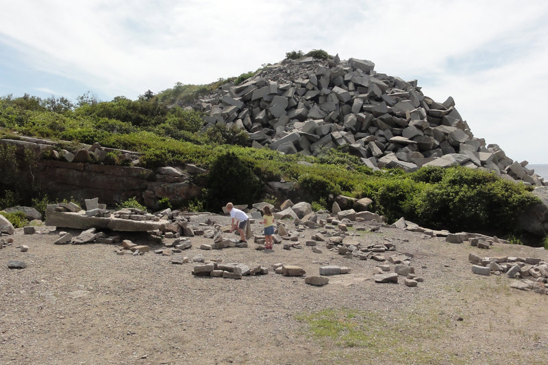 Kids playing by the rock pile at Halibut Point