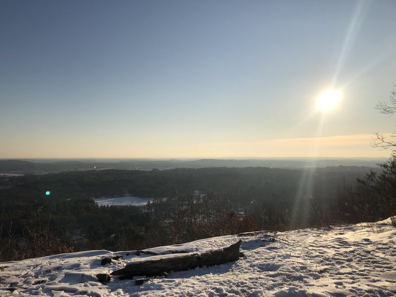 Sun rising on Monoosnoc Ridge Trail.