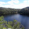 On top of the rock overlooking long pond.