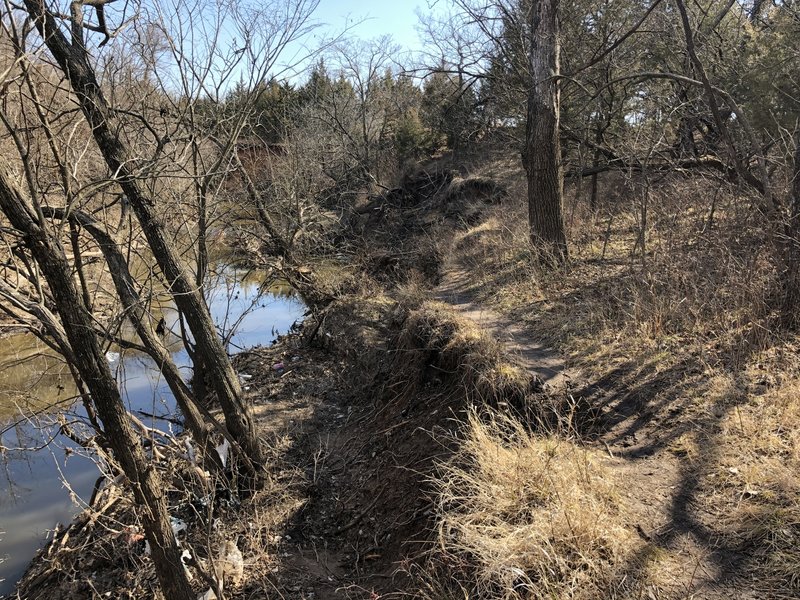 This section of trail collapsed into the creek last summer during all the flooding.  There's a go-around now.