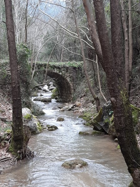 Old bridge at the bottom of the valley.