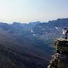 A hiker overlooking the Nyack Creek Valley near Dawson Pass.