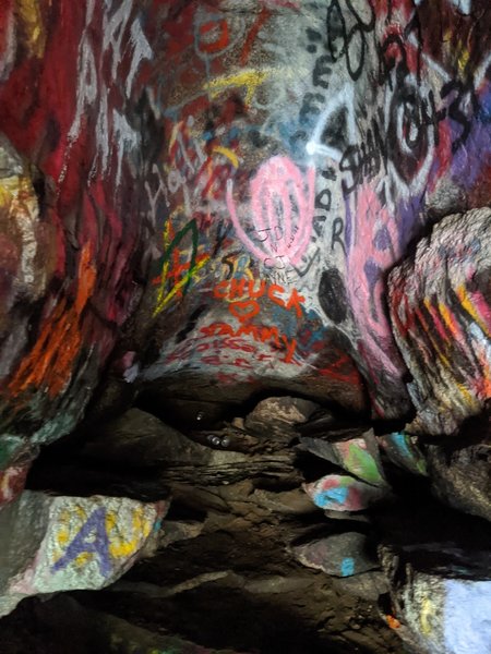 Inside the cave, lots of graffiti