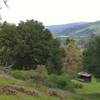 A small rustic amphitheater set in the green hills, is reached by the Amphitheater Trail in Joseph D. Grant County Park.