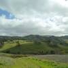 Hills of the Diablo Range to the northeast of Snell Trail. San Felipe Creek is in the valley ahead, and Mt Hamilton, 4,265 ft. center right with snow on it, is hidden in clouds.