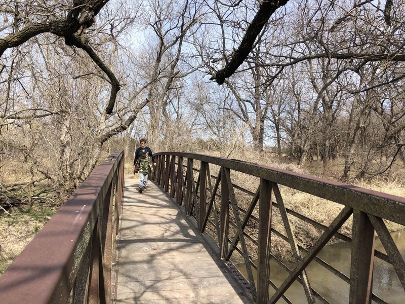 Second bridge from the North end of the park to get across the Cowskin Creek