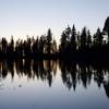 While Lassen Peak is definitely the main attraction at sunset, the view to the west is also pretty magical, as the western sky lights up through the trees the line the lake.