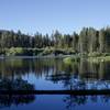 As you hike along the shore, you can watch as people fish in the lake.