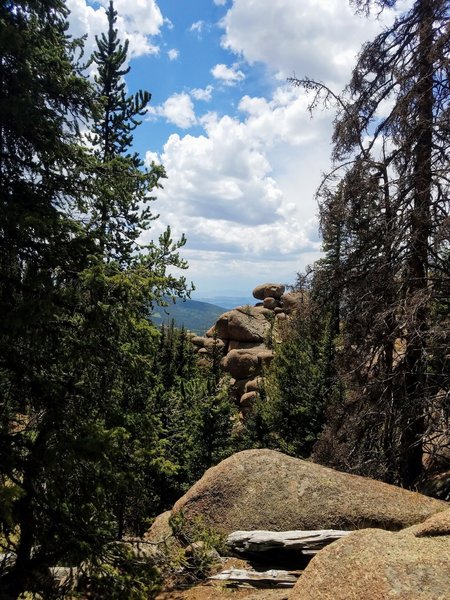 Peeking through the trees from the trail.