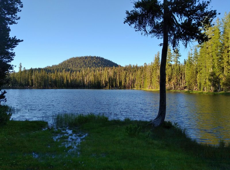 Hat Mountain, 7,695 ft., is seen to the north of Summit Lake from the lake's south shore on a clear summer evening.