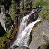 Kings Creek Falls are 40-50 feet tall as they plunge over a black basalt cliff.