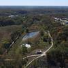 Drone footage, looking due west.  M-K-T trail to the left of photo, loop trail and Forum Connector to the center right.