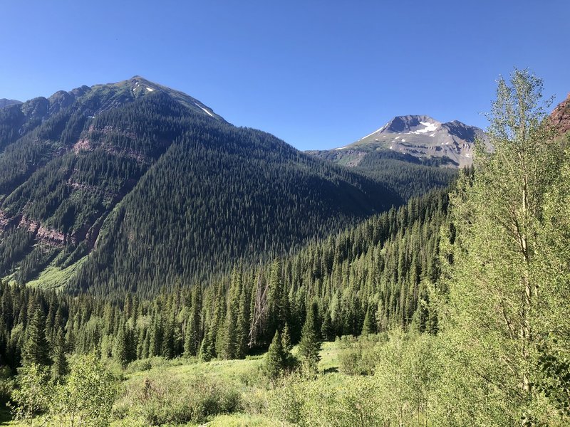 View looking at near mountains after about a mile through the Ice Lake Trail.