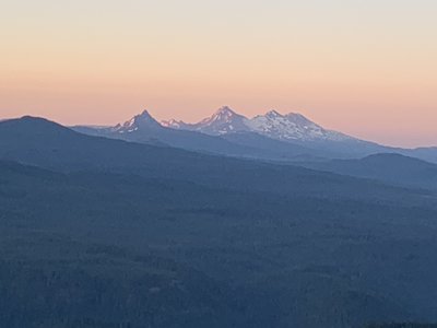 The three sisters from sunrise on Bachelor Mountain.