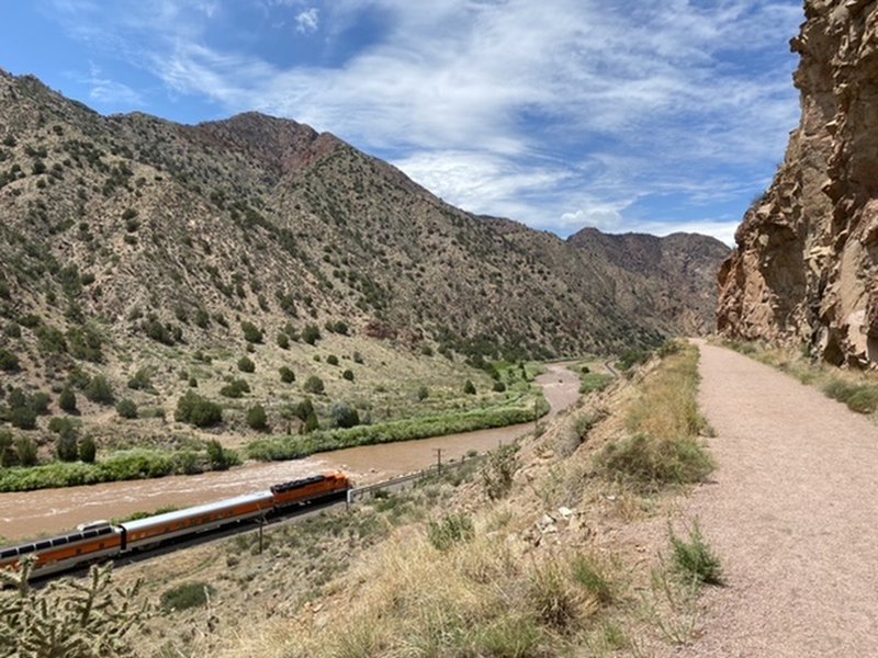 Train traveling along the Arkansas River.