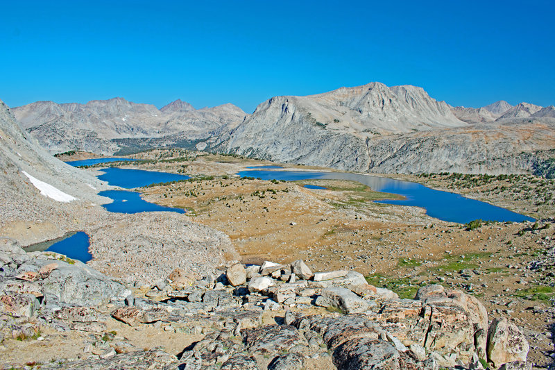From Puppet Pass. From the left bottom we see Blanc Lake, Lorraine Lake, Paris Lake and Alsace Lake. Puppet Lake and Paris Lake are on the right. Royce Lakes Basin is in the upper right.