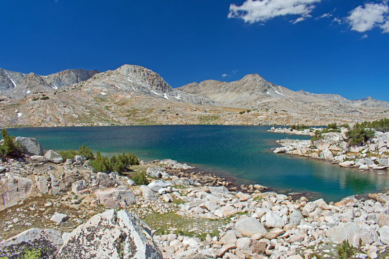 Muriel Lake. A trail-of-use to Goethe Lake runs up the low ridge on the far side of the lake.