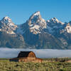 Moulton Barn on Mormon Row with the Grand Tetons, and an early morning fog.