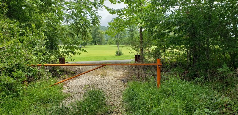 Trail ends across the street from a golf course