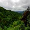 View over the Lester Creek Valley, including some rocky outcroppings, on the Wilson River Trail.