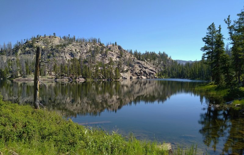 Tiny Lake Vera. Boulder Canyon Trail ends here at a trail junction with Highline Trail.