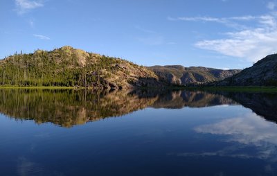 Reflections on Lake Ethel as the sun sets on a quiet July evening.