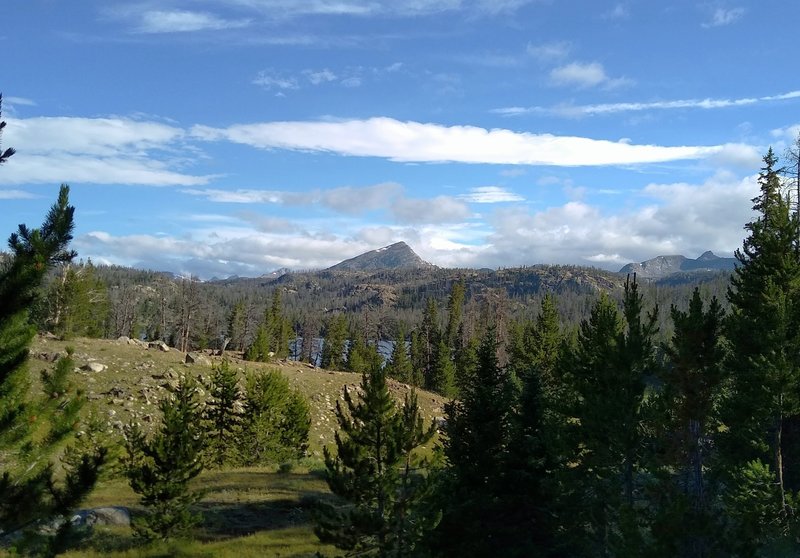 Approaching Horseshoe Lake below, from the south on Highline Trail, Mount Baldy, 11,857 feet, (center) looms in the distance