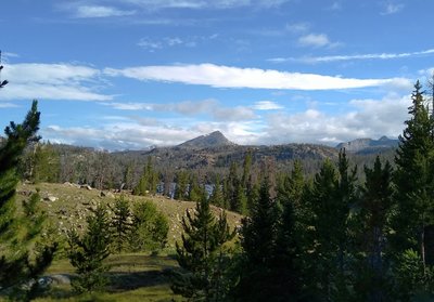 Approaching Horseshoe Lake below, from the south on Highline Trail, Mount Baldy, 11,857 feet, (center) looms in the distance