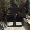 Old sluice gates sit at the end of the trail.