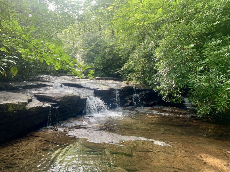 Little creek accesses are common along the Sand Spring Trail, with small water features like this waterfall.