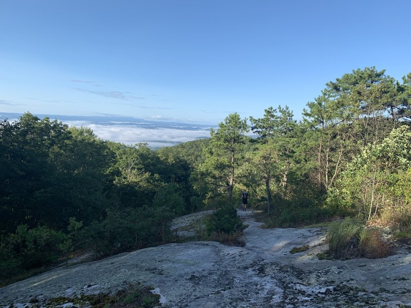 A portion of the trail that traverses bare rock on the interstate ridge line.