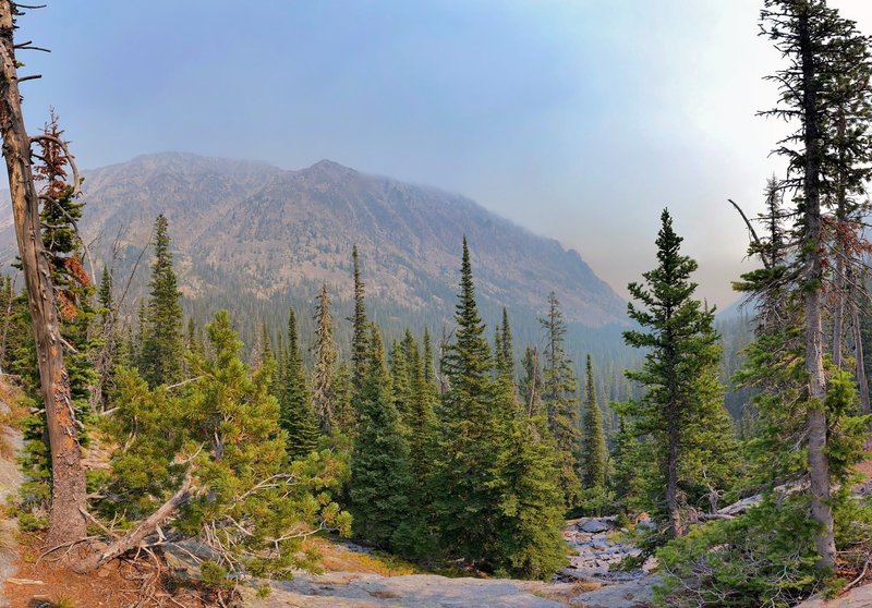 Smoky valley lies below.