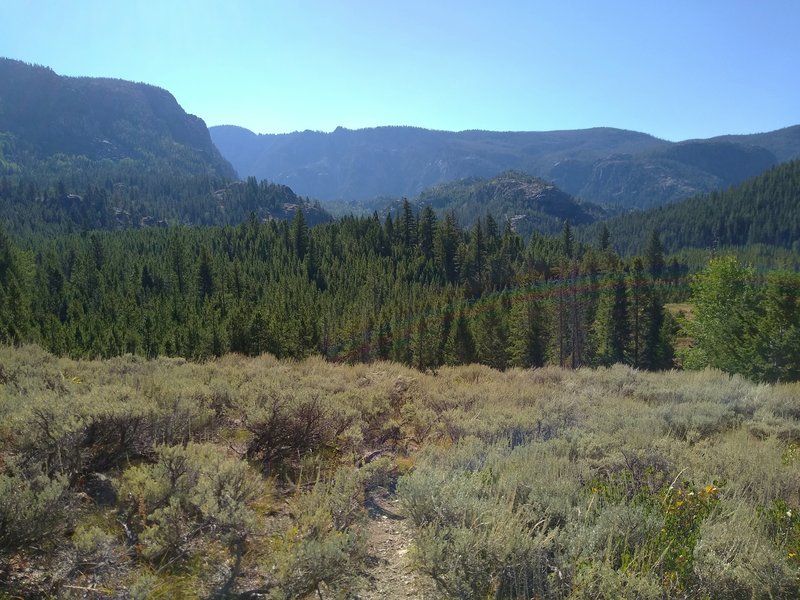 The views start to open up almost immediately as one begins climbing on Crows Nest Lookout Trail. Creeks of the Pine Creek drainage are in the deep valley beyond the nearby ridges.