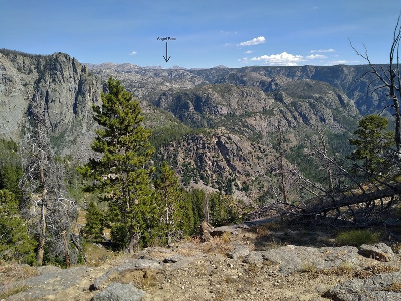 The view from Crows Nest Lookout looking east-southeast. Angel Pass is the notch in the far distance just left of center. Angel Peak is on the left side of the pass.