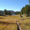 Through meadows, approaching Trapper Lake from the north on Summit Lake Trail.