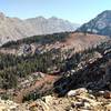 This is the top of the ridge that is the start of the NY Lake Trail. Your first step is straight ahead. Put your trekking poles in your pack as you'll need both hands.