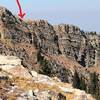 The arrow shows the beginning of the decent route on the New York Lake Trail, taken from the bottom of the headwall.