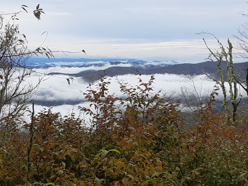 Mountains rising above the clouds.