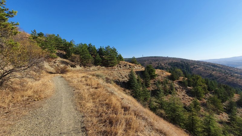 Looking back at the trail while climbing Üçgenzi Patikası (Trail).