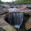 Salto de Aguila "Caño Cristales" by szeke is licensed under CC BY-SA 2.0