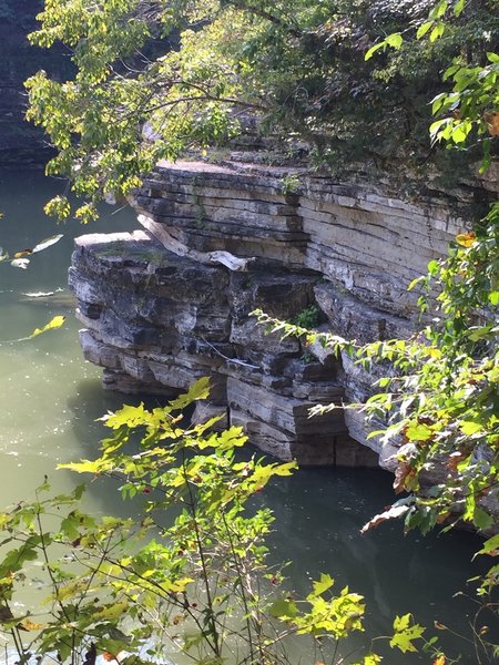 Beautiful rock face with resting log.