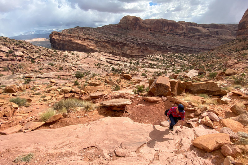 Ashley rounds a uneven switchback on the Portal Trail.