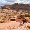 Ashley rounds a uneven switchback on the Portal Trail.