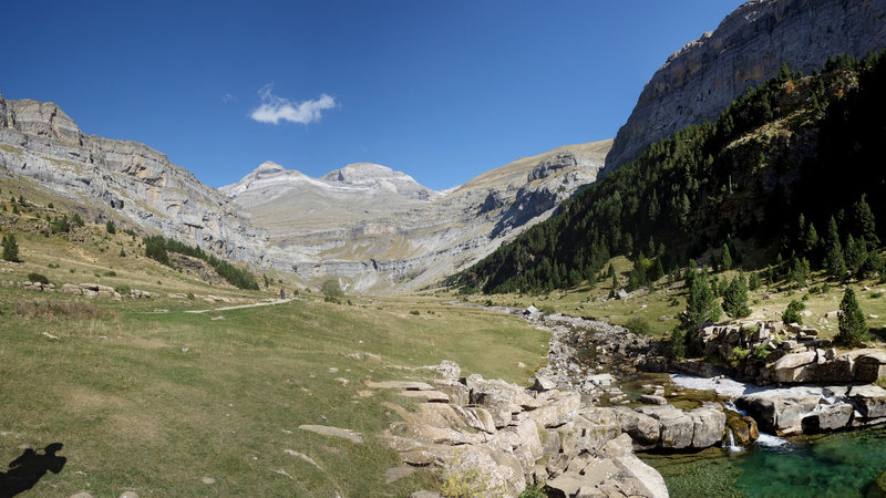 Panoramic view Circo del Soaso (Soaso cirque) with the trail at the left and Rio Arazas at the right