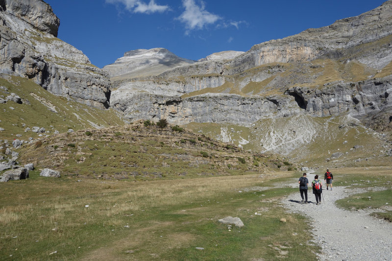 Three hikers about two-thirds of the way through Circo del Soaso (Soaso cirque)