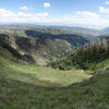 70 degree panorama from the Mt Nebo bench trail with Hop Creek Ridge center left and Salt Creek Peak at the far right