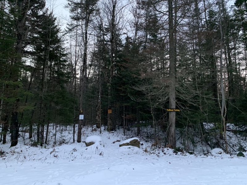 The entrance by the trailhead, the sign in box is just up the trail!