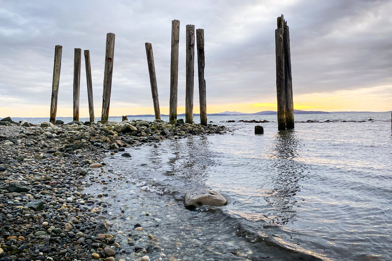 These wood pillars stand tall at the far end of Clayton Beach.