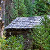 A historic hut next to the American River Trail