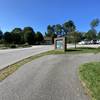 Paved path leading out of Wong Park entrance from Wilson Avenue.